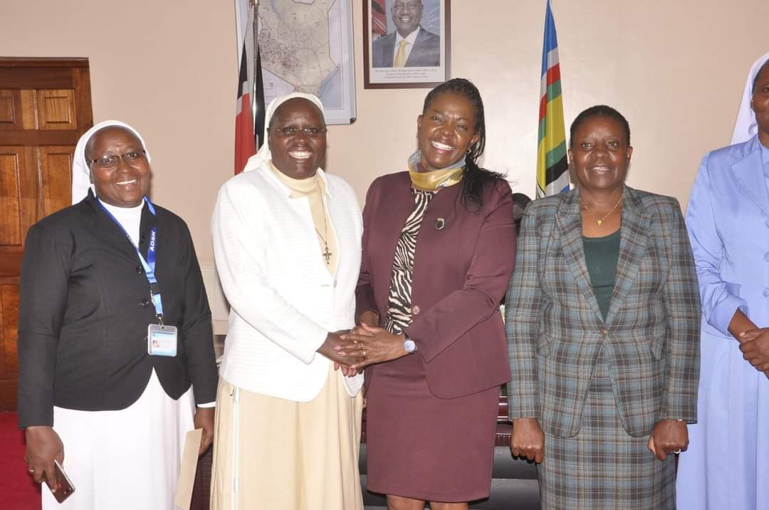 PS Anne Wang'ombe poses with ASOK Executive Secretary Sr. Pasilisa Namkoye during the courtesy call