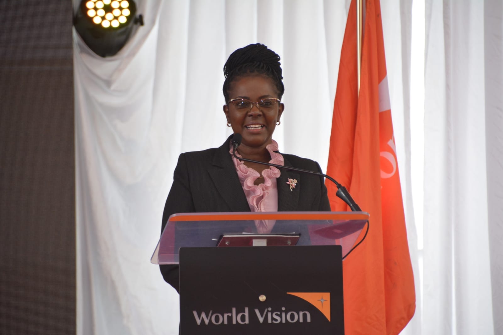 Gender PS Anne Wangómbe speaks during the launch of #Enough by the World Vision