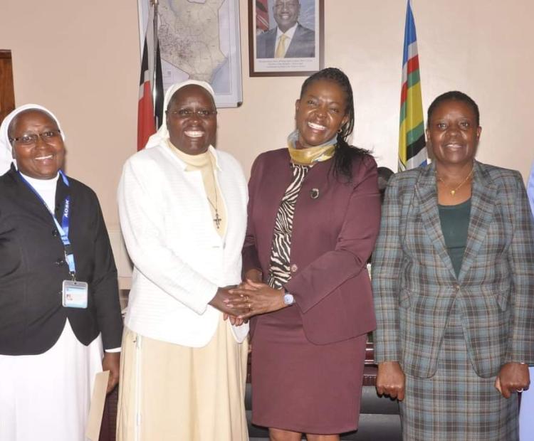 PS Anne Wang'ombe poses with ASOK Executive Secretary Sr. Pasilisa Namkoye during the courtesy call