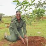 Cabinet Secretary for Gender, Culture the Arts and Heritage Hon. Aisha Jumwa plants a tree during the National Tree Growing exercise on Nzoia Forest Station, Kakamega County